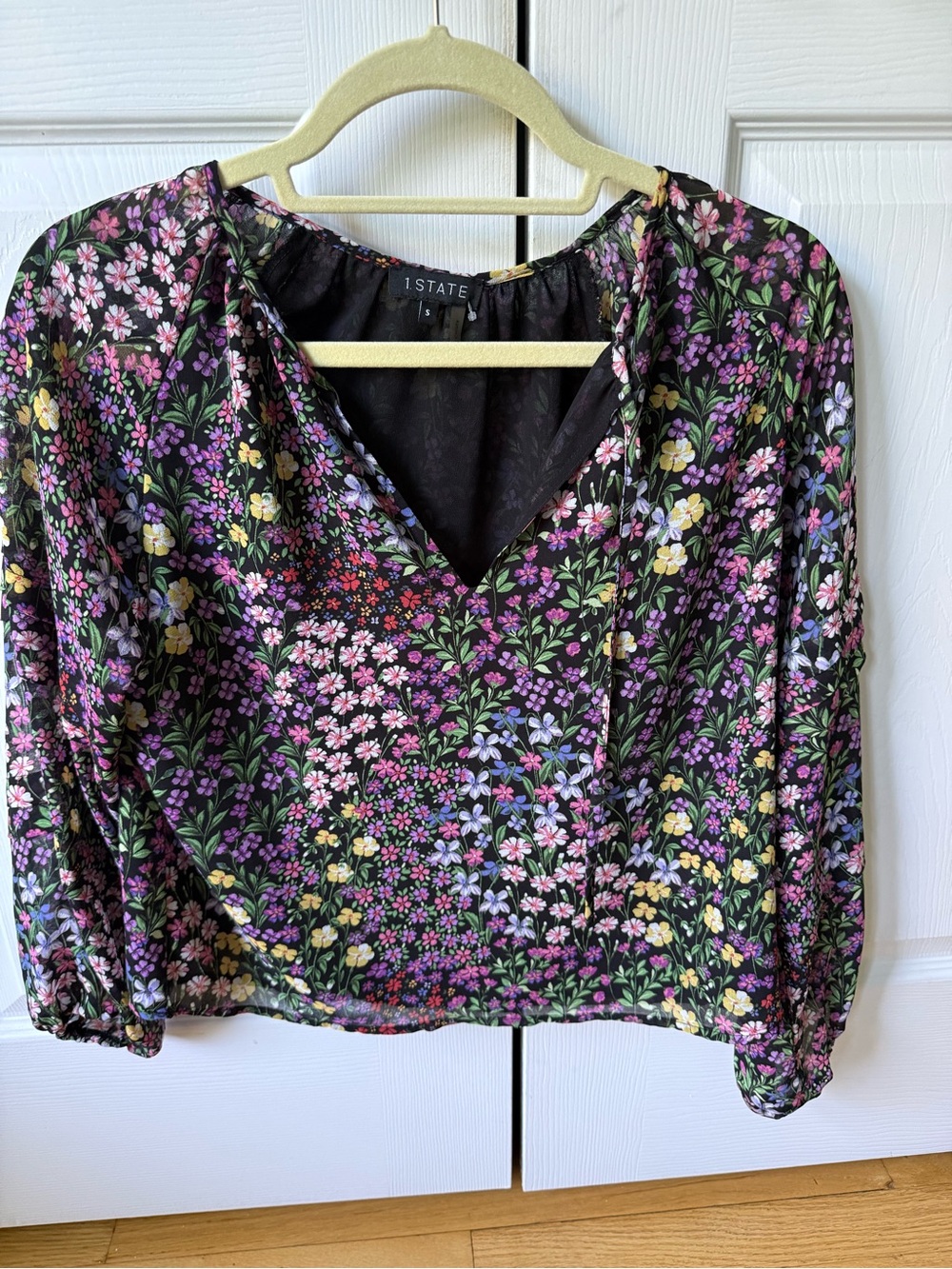 1. State Black Floral V-Neck Blouse with Pink, Purple and Yellow Accents